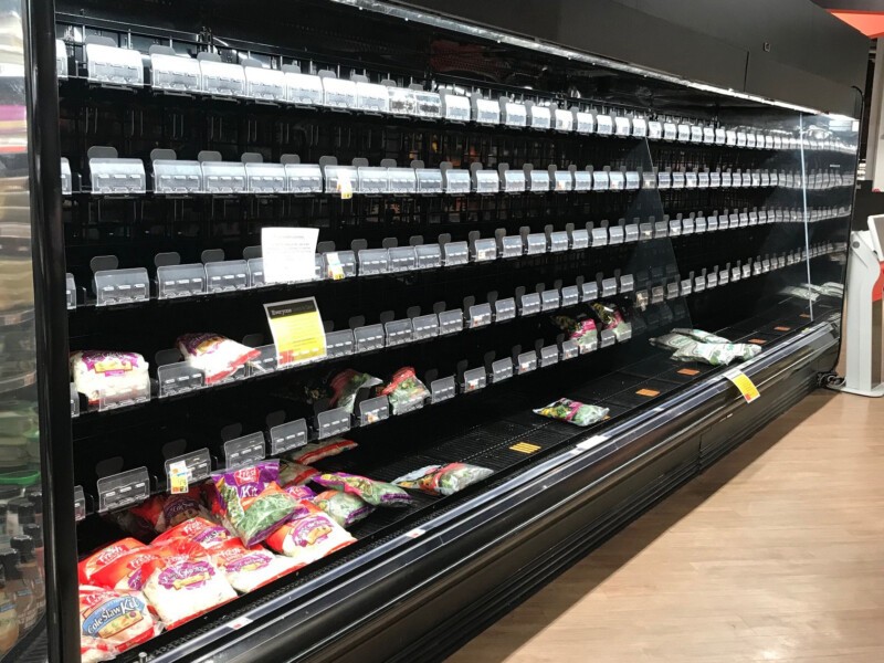 Empty lettuce shelves at grocery stores