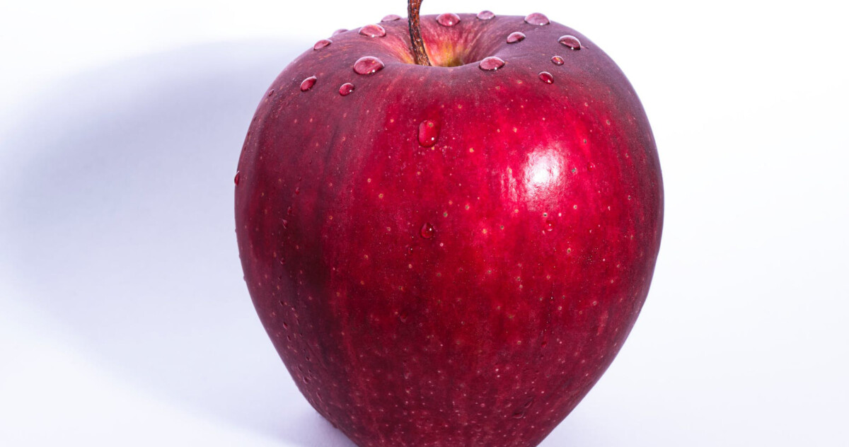 Shinny apple on table