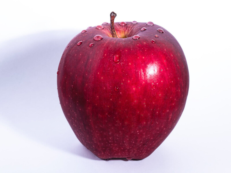 Shinny apple on table